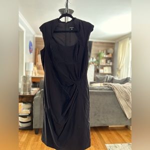 Black cocktail dress with cool neckline